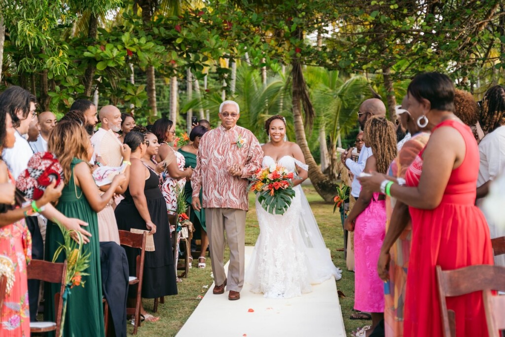 Kerron Duncan and Dr. Malika Grayson tied the knot in a beautiful destination wedding at Pigeon Point Heritage Park, Tobago.