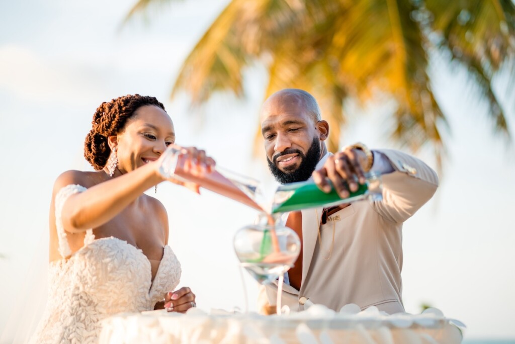 Kerron Duncan and Dr. Malika Grayson tied the knot in a beautiful destination wedding at Pigeon Point Heritage Park, Tobago.