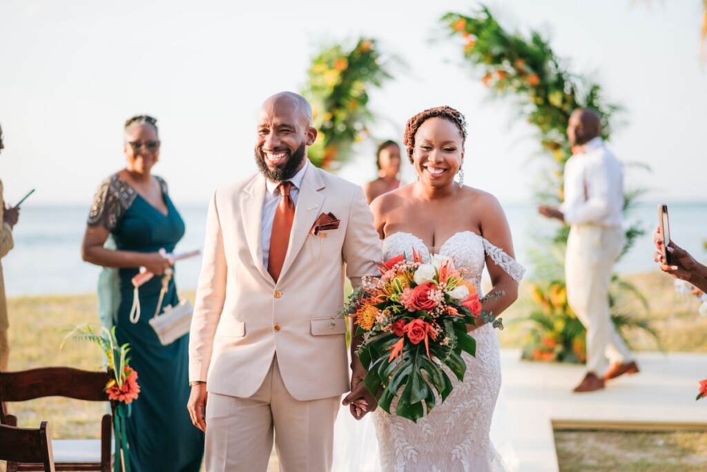 Kerron Duncan and Dr. Malika Grayson tied the knot in a beautiful destination wedding at Pigeon Point Heritage Park, Tobago.