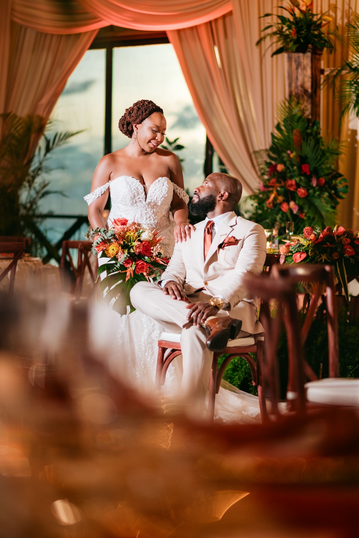 Kerron Duncan and Dr. Malika Grayson tied the knot in a beautiful destination wedding at Pigeon Point Heritage Park, Tobago.