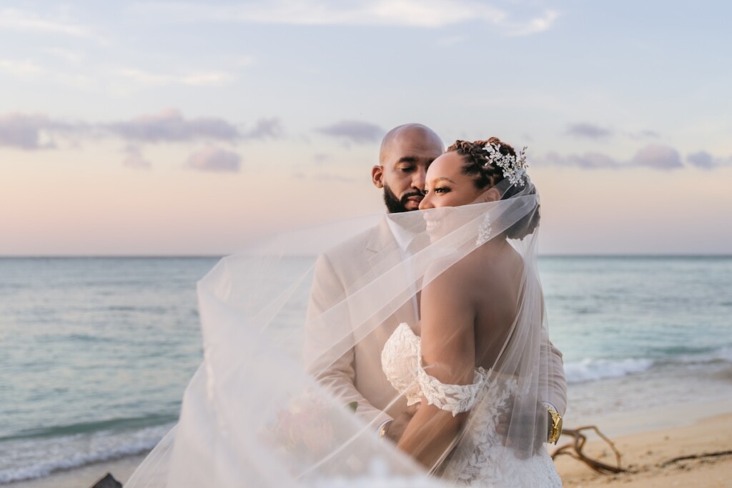 Kerron Duncan and Dr. Malika Grayson tied the knot in a beautiful destination wedding at Pigeon Point Heritage Park, Tobago.