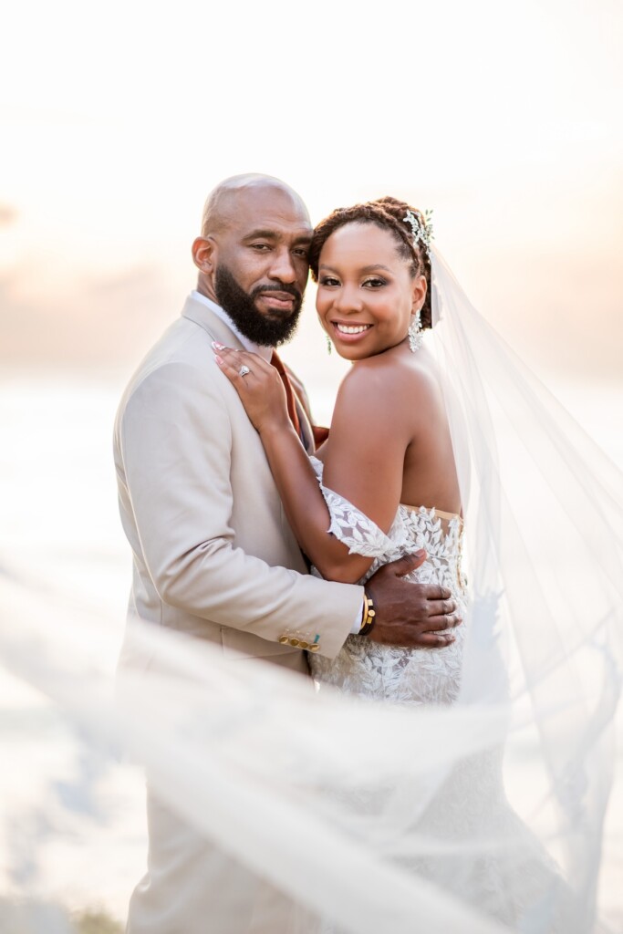 Kerron Duncan and Dr. Malika Grayson tied the knot in a beautiful destination wedding at Pigeon Point Heritage Park, Tobago.