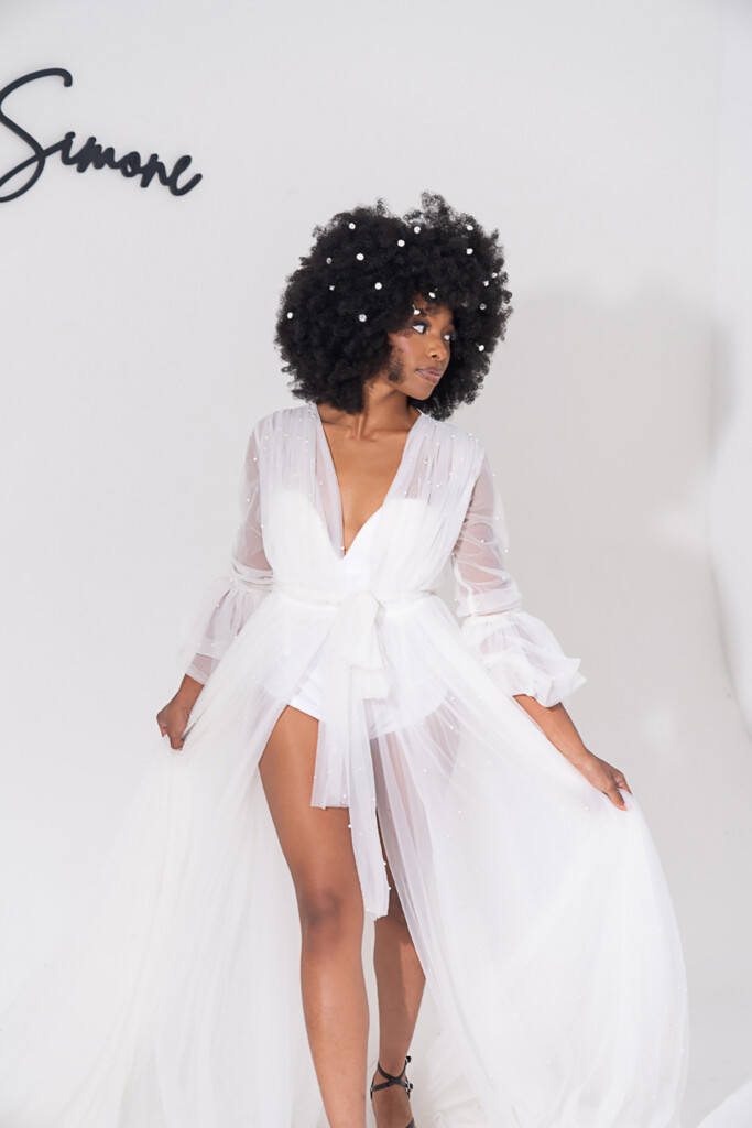 On September 7th, 2024, Muna Coterie designer Dani Simone Couture showcased her latest gown designs in "Love Story" at New York Fashion Week.