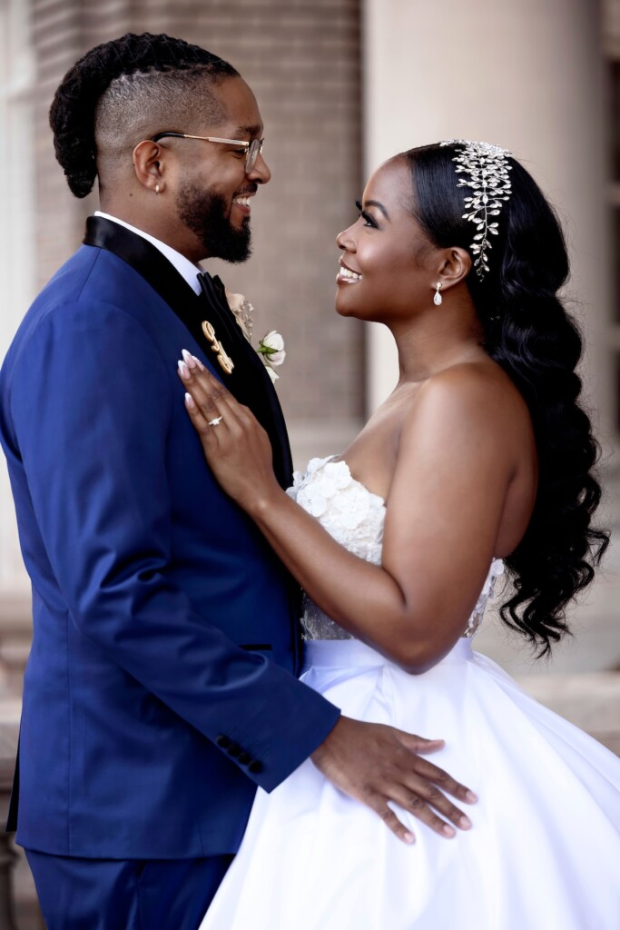 Arianna and Philip wed in a classic black and white wedding at The Georgian Terrace in Atlanta with soft pinks, golds, and romantic details.