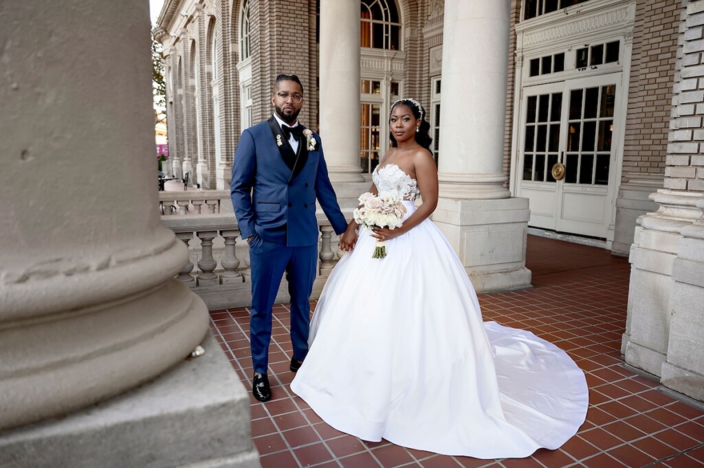 Arianna and Philip wed in a classic black and white wedding at The Georgian Terrace in Atlanta with soft pinks, golds, and romantic details.