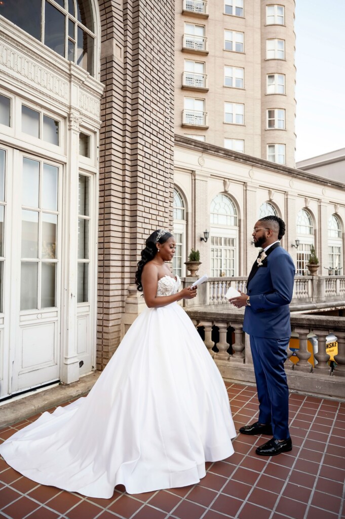 Arianna and Philip wed in a classic black and white wedding at The Georgian Terrace in Atlanta with soft pinks, golds, and romantic details.