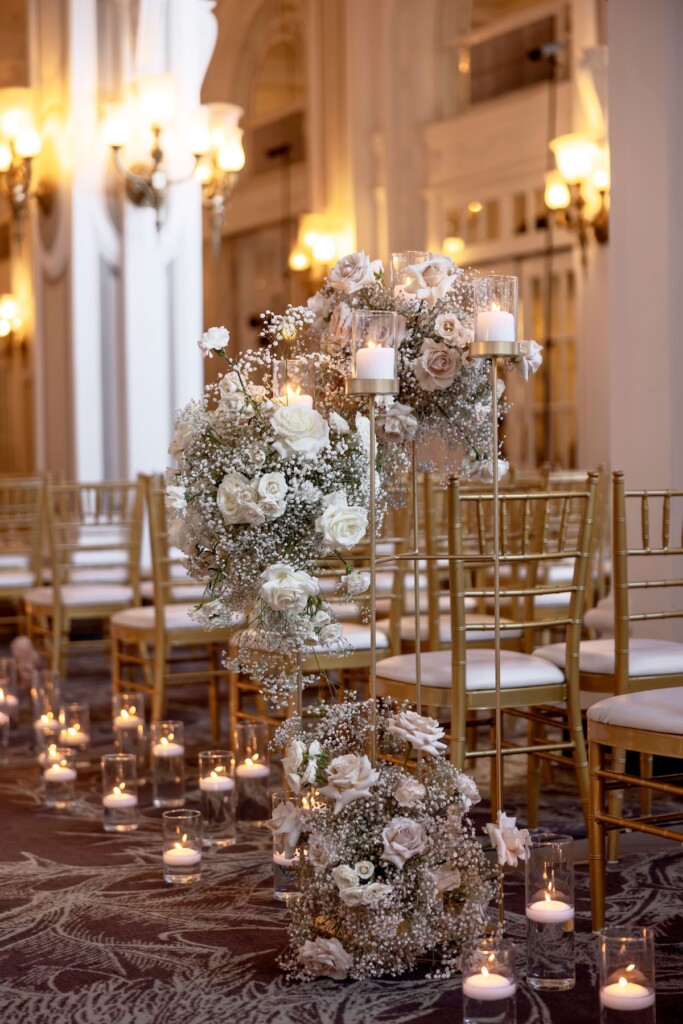 Arianna and Philip wed in a classic black and white wedding at The Georgian Terrace in Atlanta with soft pinks, golds, and romantic details.