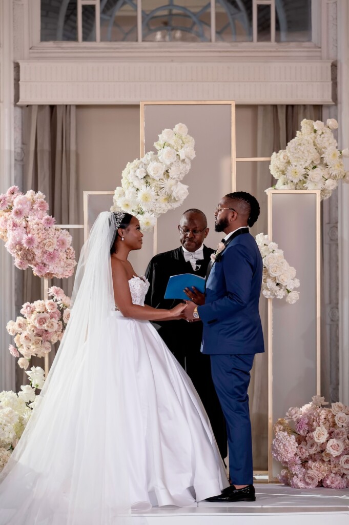 Arianna and Philip wed in a classic black and white wedding at The Georgian Terrace in Atlanta with soft pinks, golds, and romantic details.