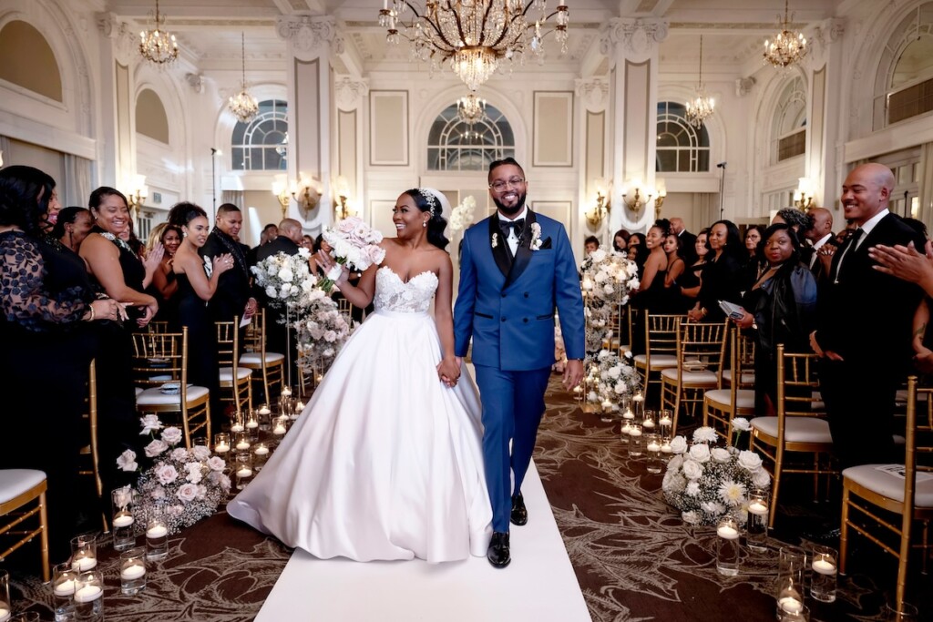 Arianna and Philip wed in a classic black and white wedding at The Georgian Terrace in Atlanta with soft pinks, golds, and romantic details.