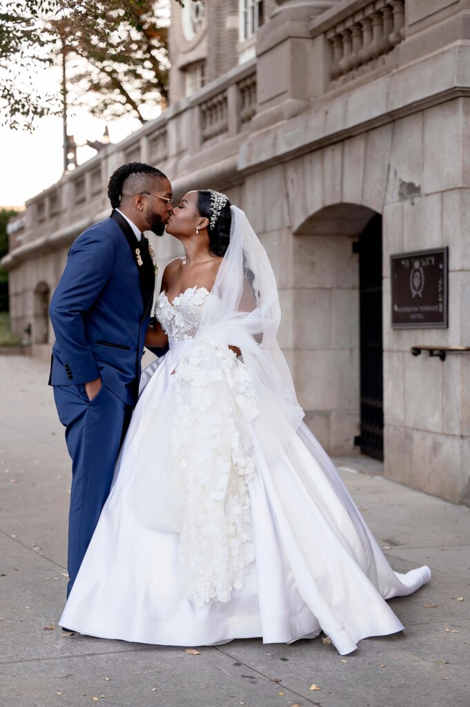 Arianna and Philip wed in a classic black and white wedding at The Georgian Terrace in Atlanta with soft pinks, golds, and romantic details.