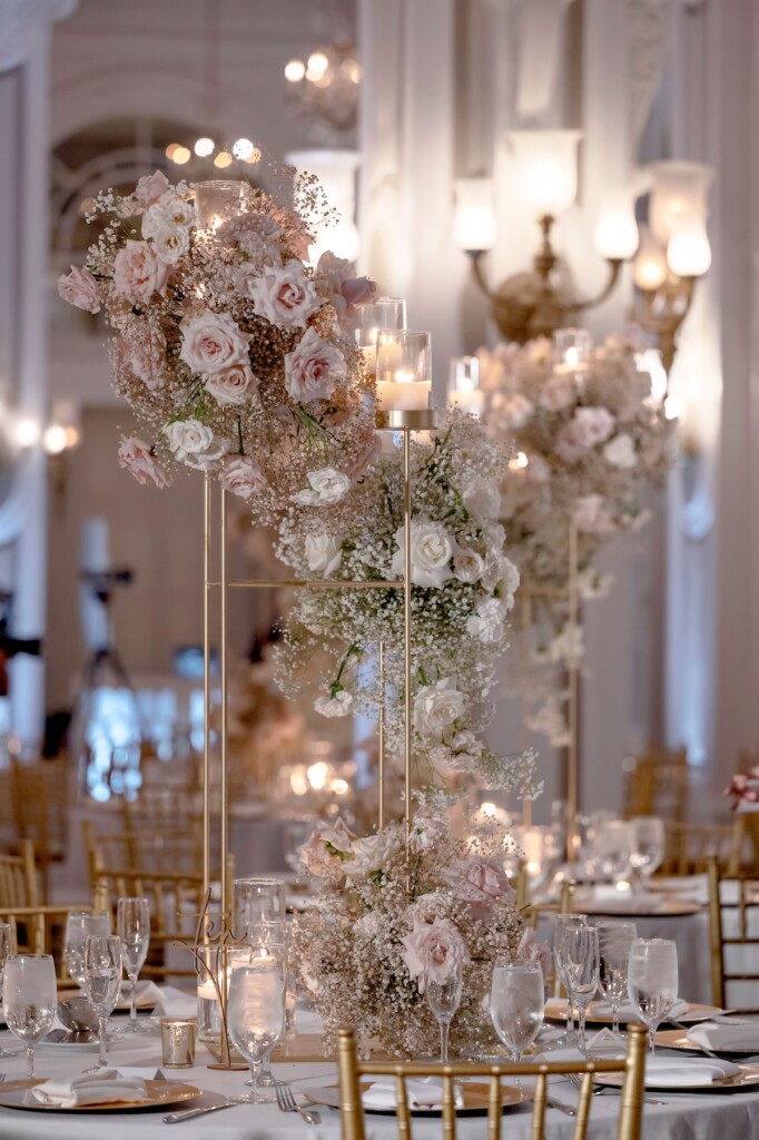 Arianna and Philip wed in a classic black and white wedding at The Georgian Terrace in Atlanta with soft pinks, golds, and romantic details.