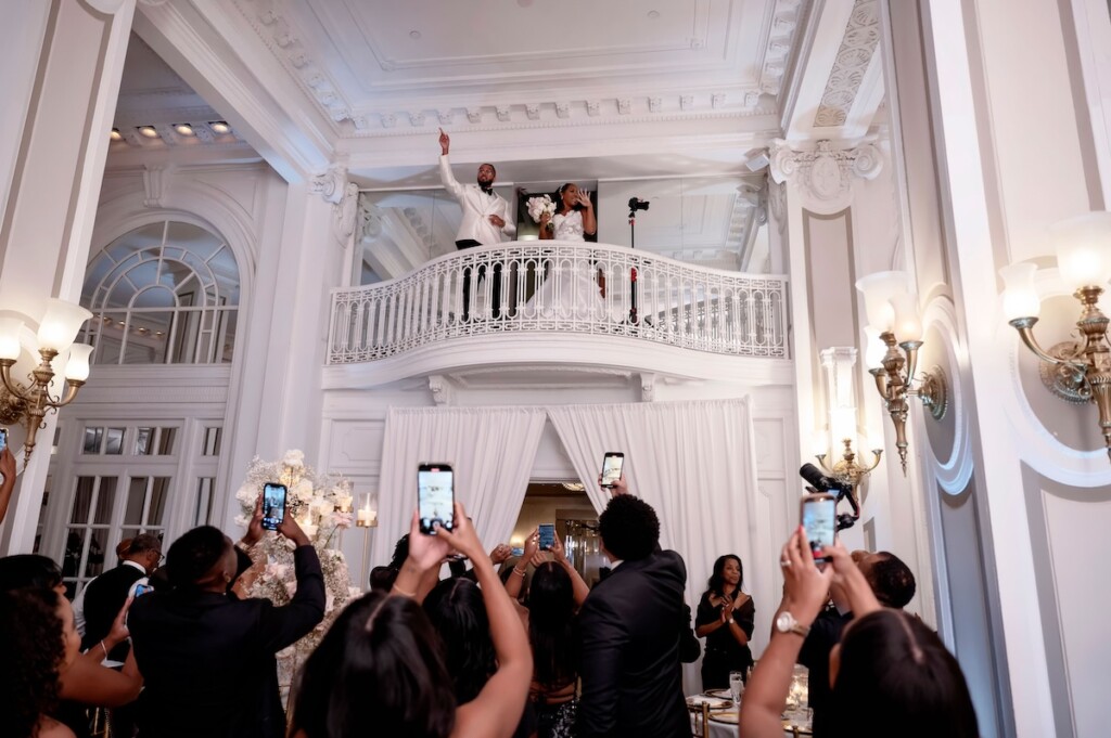 Arianna and Philip wed in a classic black and white wedding at The Georgian Terrace in Atlanta with soft pinks, golds, and romantic details.