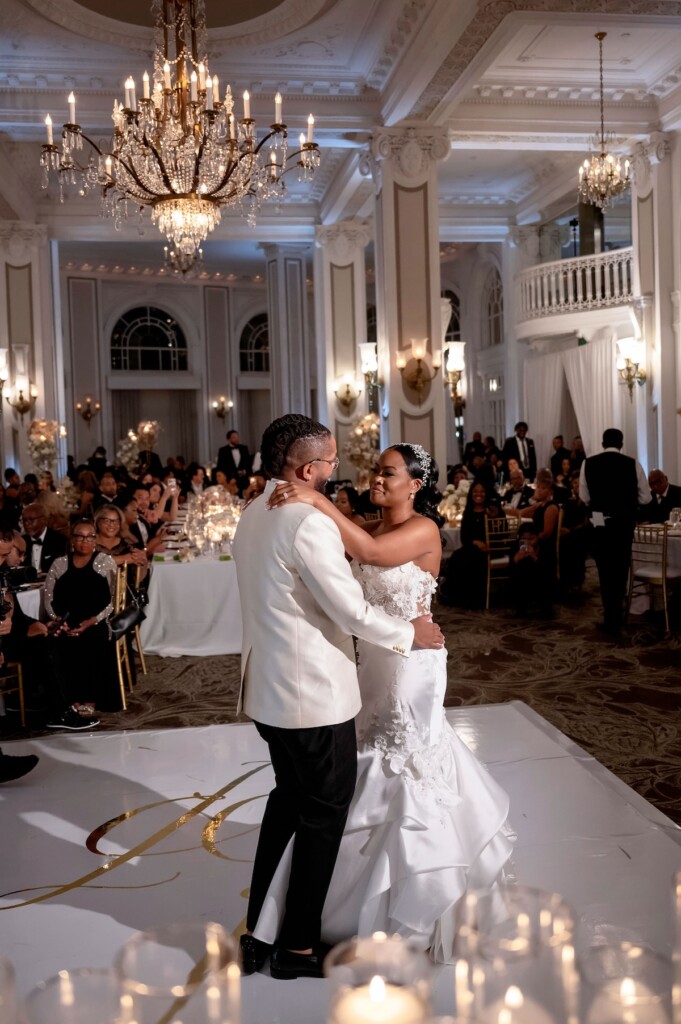 Arianna and Philip wed in a classic black and white wedding at The Georgian Terrace in Atlanta with soft pinks, golds, and romantic details.