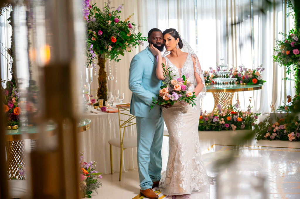 Behind The Veil Academy by Larger Than Life Events presents an enchanted garden wedding with fuzzy peach decor details, florals, and balloons.