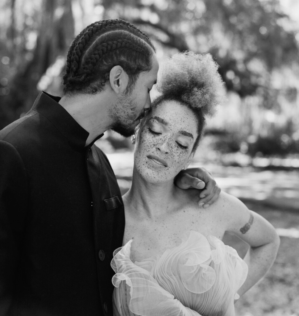 A canopy of Spanish moss and soft, ethereal light set the stage for this enchanting-styled shoot on Amelia Island.