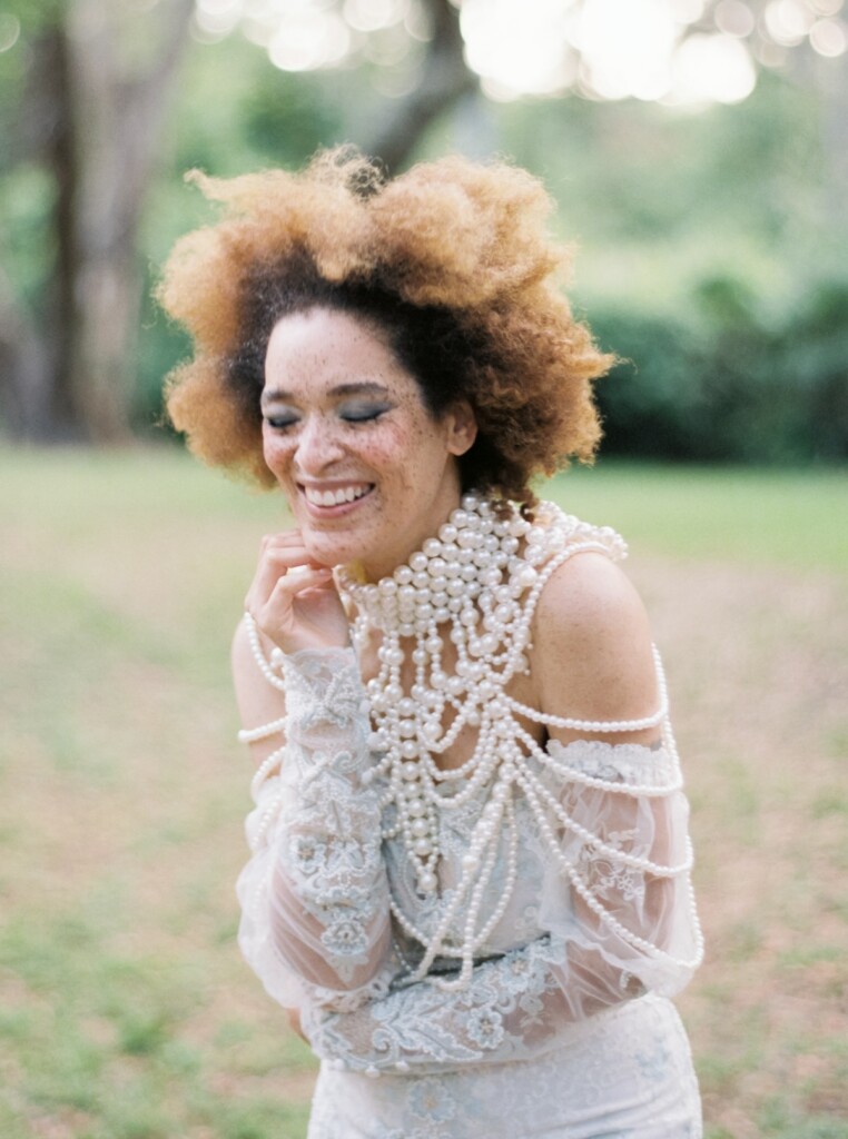 A canopy of Spanish moss and soft, ethereal light set the stage for this enchanting-styled shoot on Amelia Island.