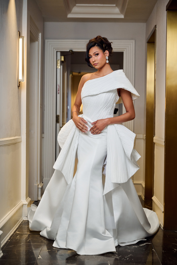 At New York Bridal Fashion Week (NYBFW) 2024, MunaCoterie dress designer Leah Langley-McClean of ElleNelle Bridal, unveiled her latest couture gown collection, "Becoming," at The Fringe Collective.