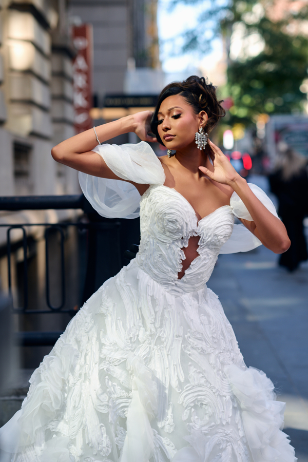 At New York Bridal Fashion Week (NYBFW) 2024, MunaCoterie dress designer Leah Langley-McClean of ElleNelle Bridal, unveiled her latest couture gown collection, "Becoming," at The Fringe Collective.