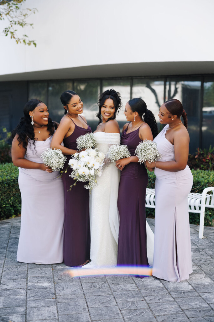 Tonasha and Brandon celebrated their love in a beautiful chic wedding with soft pink and mauve hues, touches of blue, and gold decor details.