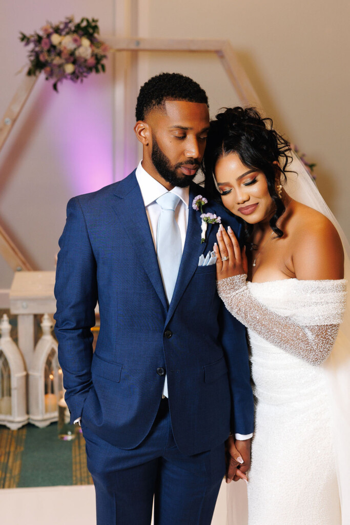 Tonasha and Brandon celebrated their love in a beautiful chic wedding with soft pink and mauve hues, touches of blue, and gold decor details.