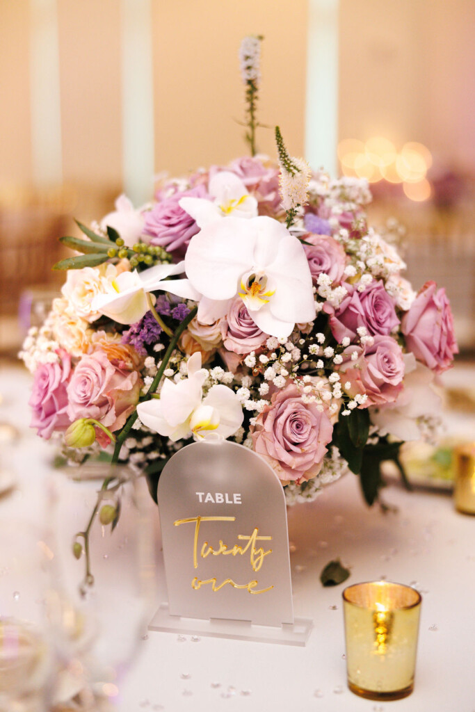 Tonasha and Brandon celebrated their love in a beautiful chic wedding with soft pink and mauve hues, touches of blue, and gold decor details.