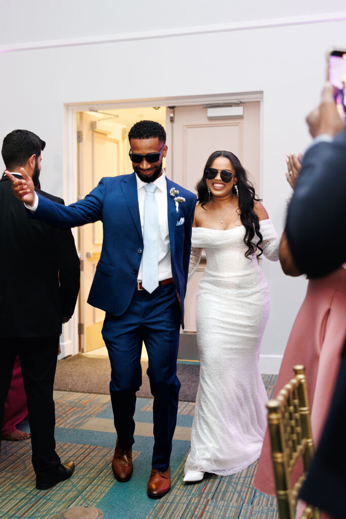 Tonasha and Brandon celebrated their love in a beautiful chic wedding with soft pink and mauve hues, touches of blue, and gold decor details.