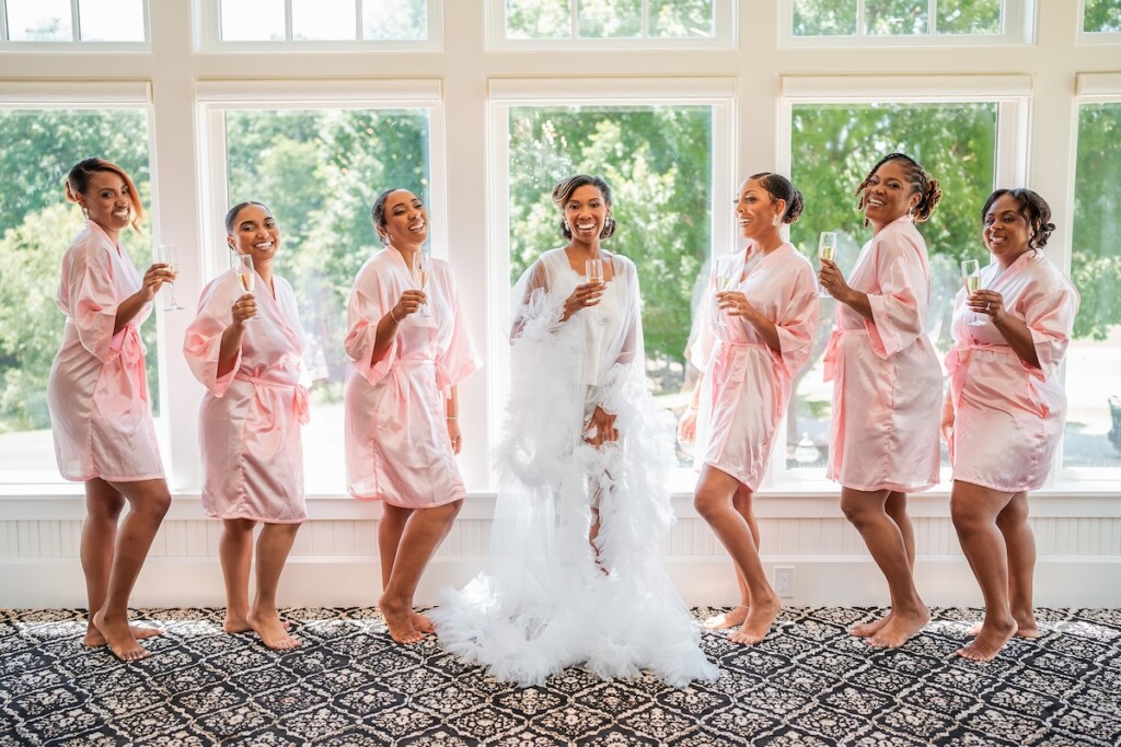 Khrystina and Ray's luxury golf resort wedding on Lake Norman featured bright pastels, vibrant florals, and regal dining room reception decor.