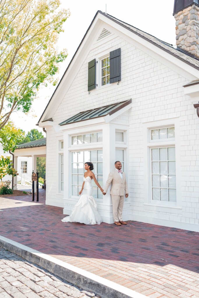 Khrystina and Ray's luxury golf resort wedding on Lake Norman featured bright pastels, vibrant florals, and regal dining room reception decor.