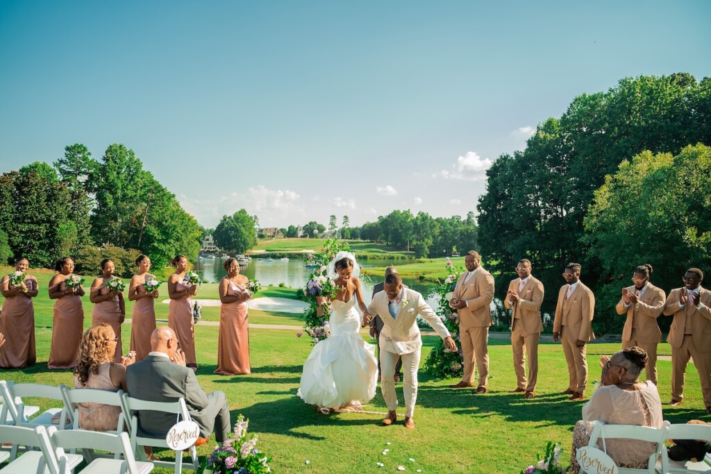 Khrystina and Ray's luxury golf resort wedding on Lake Norman featured bright pastels, vibrant florals, and regal dining room reception decor.