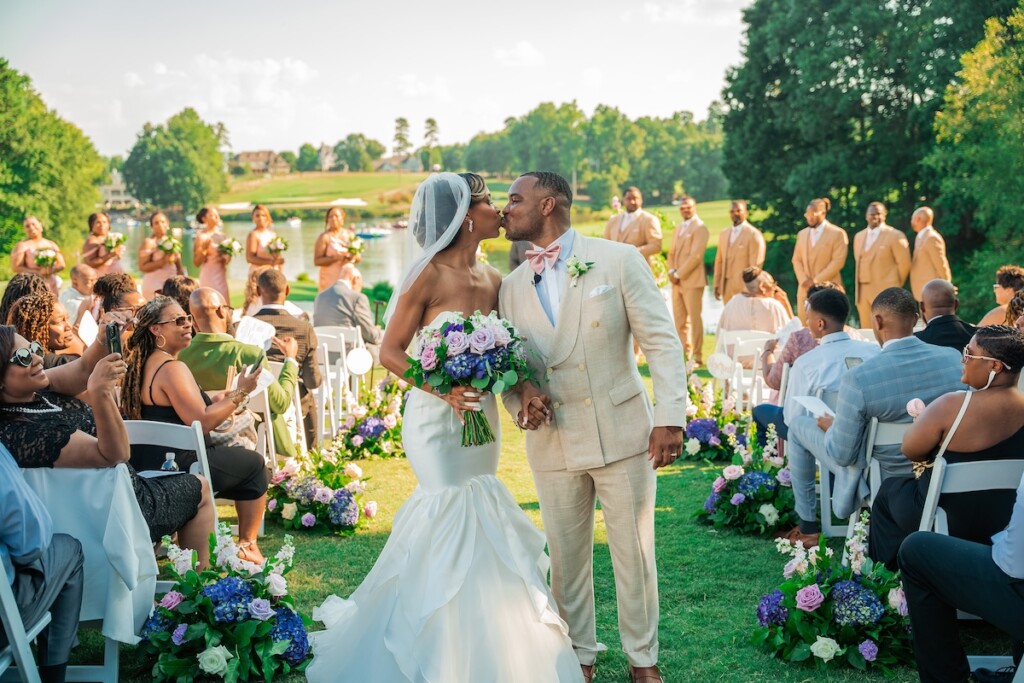 Khrystina and Ray's luxury golf resort wedding on Lake Norman featured bright pastels, vibrant florals, and regal dining room reception decor.