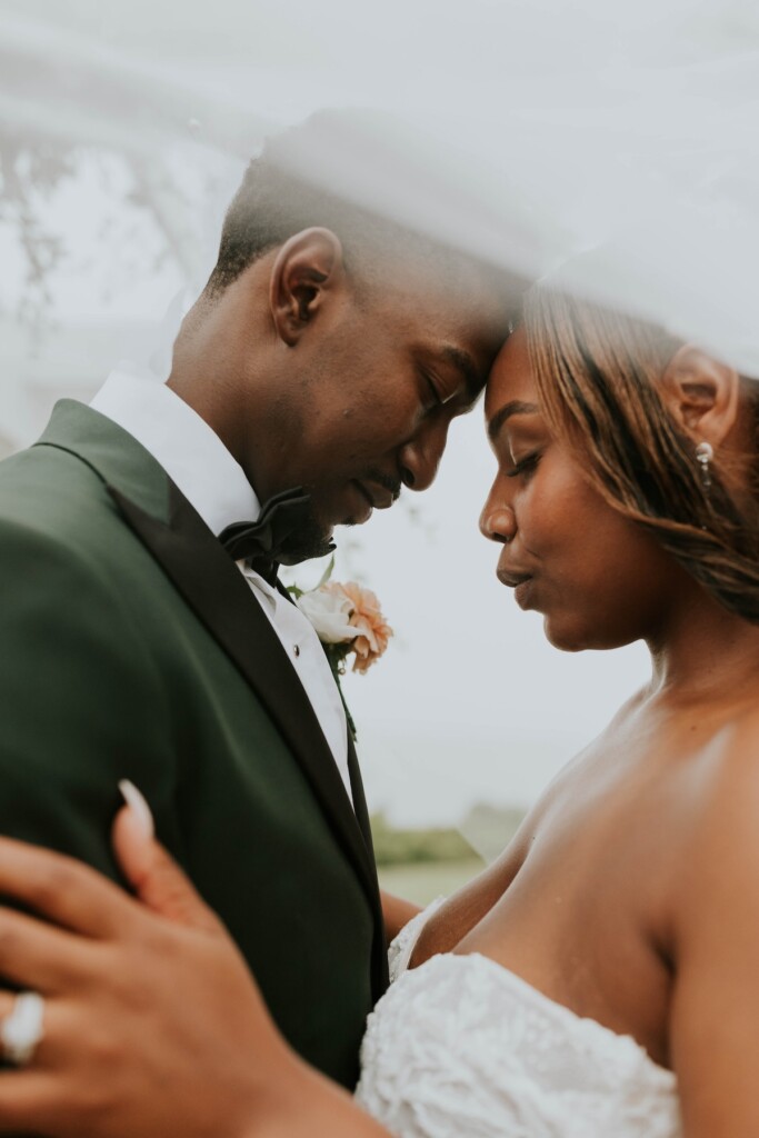 Atiera & Joshua hosted an intimate "Night Before" celebration, followed by a beautiful earth-tone wedding at the Oceancliff Hotel in Newport.