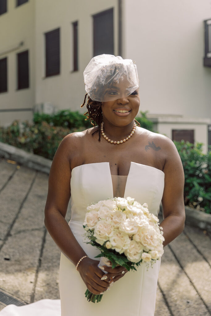 Krystal and Alonzo’s dreamy tropical garden wedding in Marigot Bay, St. Lucia features custom fashion and romantic pink blooms!