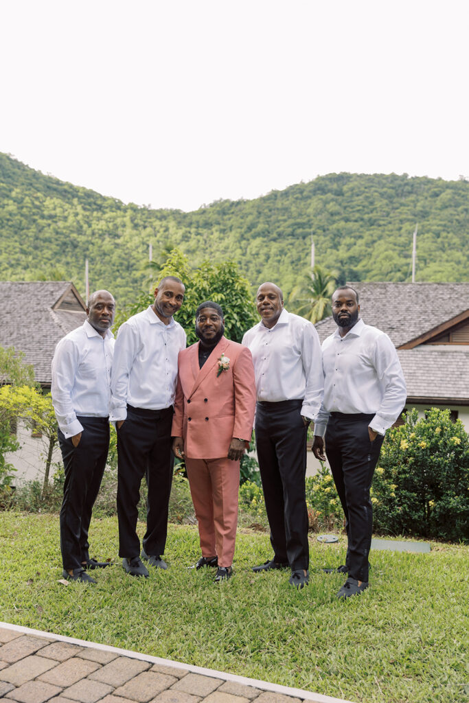 Krystal and Alonzo’s dreamy tropical garden wedding in Marigot Bay, St. Lucia features custom fashion and romantic pink blooms!