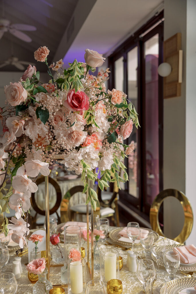 Krystal and Alonzo’s dreamy tropical garden wedding in Marigot Bay, St. Lucia features custom fashion and romantic pink blooms!