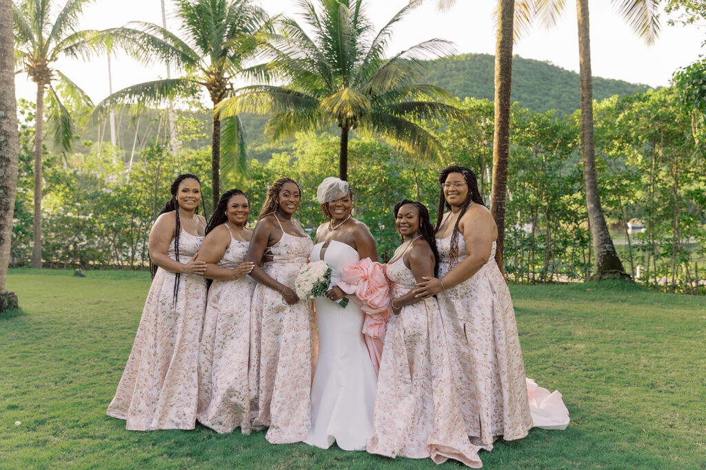 Krystal and Alonzo’s dreamy tropical garden wedding in Marigot Bay, St. Lucia features custom fashion and romantic pink blooms!