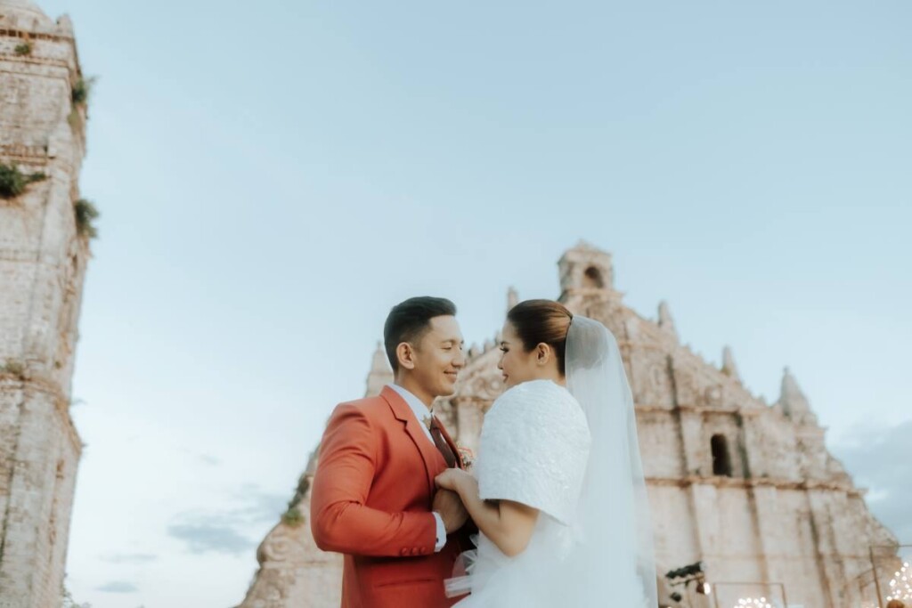 A decade after they began secretly dating, Marck and Lovely celebrated their union with an elegant garden wedding at the stunning San Agustin Church, a UNESCO World Heritage Site in the Philippines. 