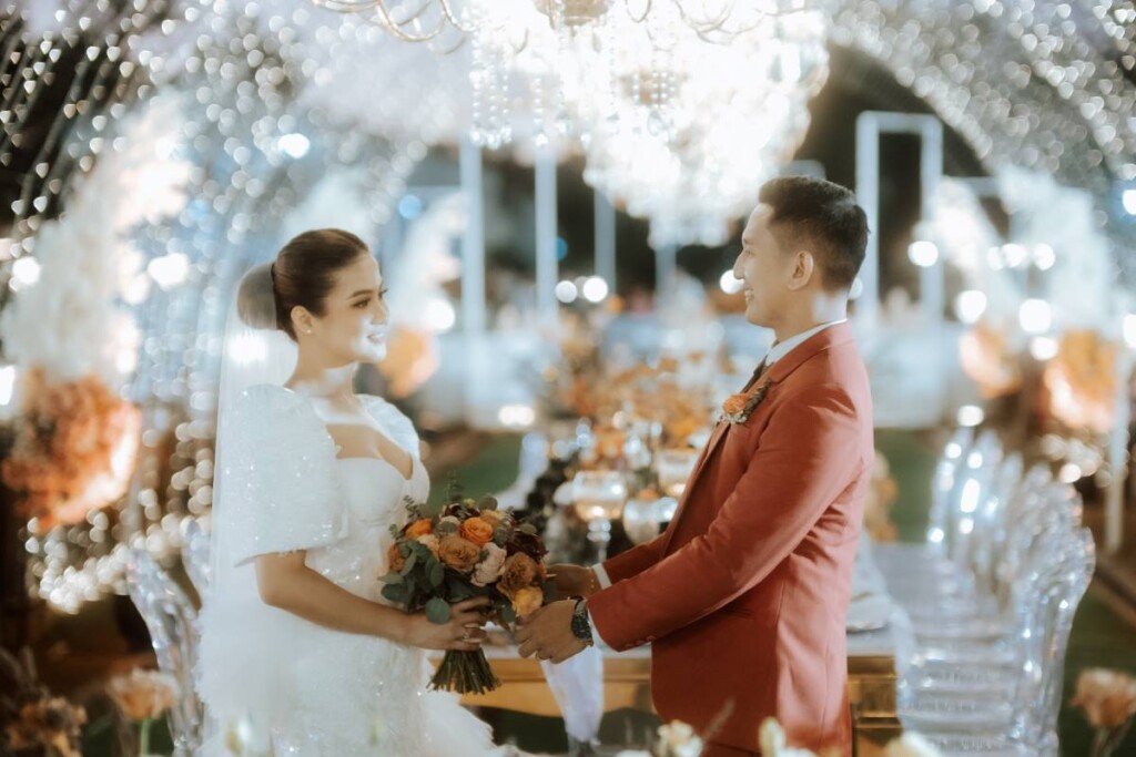 After starting their relationship in secret over a decade ago, Marck and Lovely celebrated their union with an elegant garden wedding at the stunning San Agustin Church, a UNESCO World Heritage Site in the Philippines. 