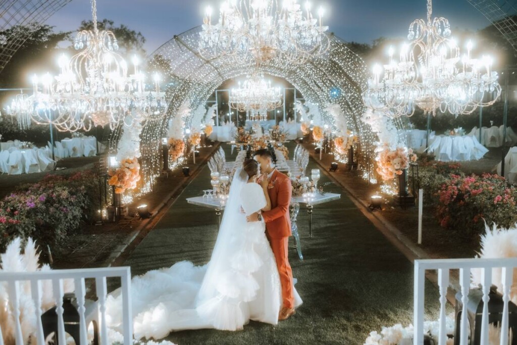 After starting their relationship in secret over a decade ago, Marck and Lovely celebrated their union with an elegant garden wedding at the stunning San Agustin Church, a UNESCO World Heritage Site in the Philippines. 