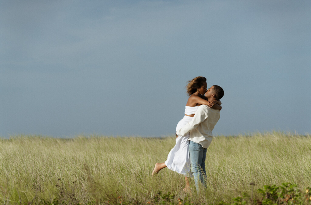 Nia and Cameron found love through a series of fortunate events. They celebrated with a romantic engagement shoot at Edgartown Lighthouse.