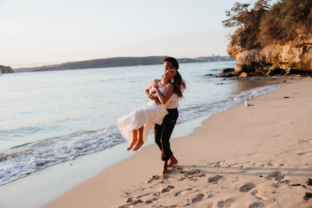 Joshua and Aly let their love shine through in a playful, beachy engagement session on the shores of Watsons Bay in Sydney, Australia.