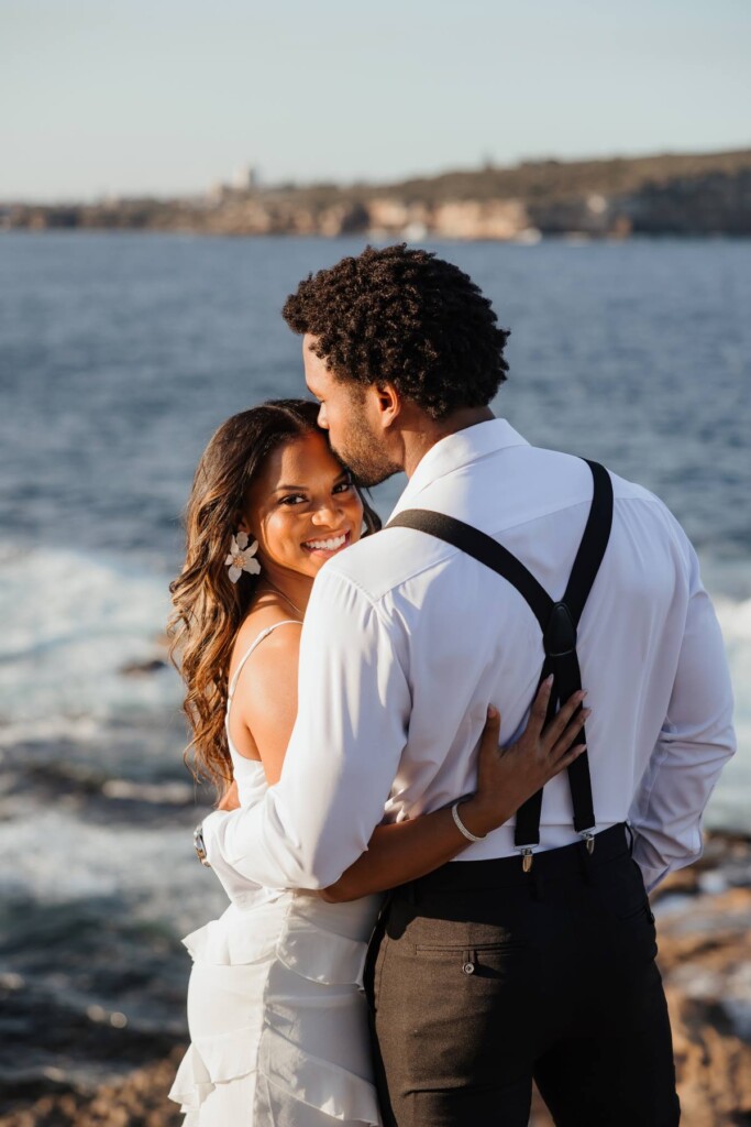 Joshua and Aly let their love shine through in a playful, beachy engagement session on the shores of Watsons Bay in Sydney, Australia.