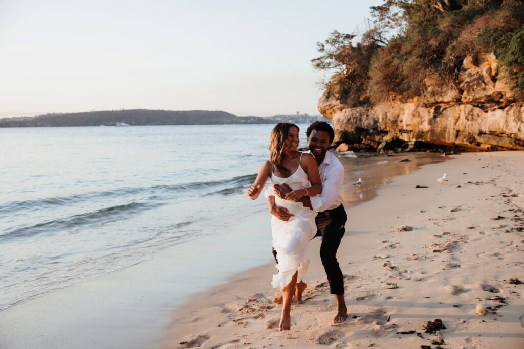 Joshua and Aly let their love shine through in a playful, beachy engagement session on the shores of Watsons Bay in Sydney, Australia.